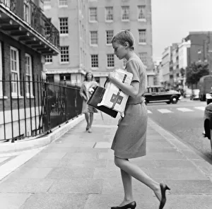 Carrying Prints: Mia Farrow seen here returning to her Grosvenor Square apartment after a shopping trip