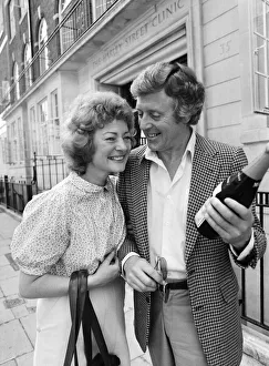 Bottle Prints: Michael Aspel and his wife Lizzie Power leaving a Harley Street Clinic. 5th June 1982