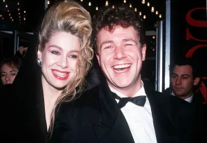 Michael Ball actor singer with unknown woman at the premiere of the film Scandal