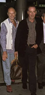 Michael Barrymore TV Presenter with Maurice Leonard Producer leaving Heathrow for Chicago
