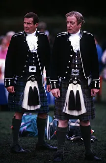 00028 Prints: Michael Caine actor and Roger Moore actor at Inveraray Castle in Argyll