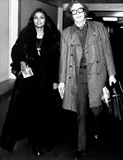 Michael Caine actor with wife Shakira at airport - December 1972 Dbase