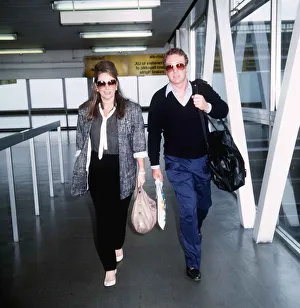 Obit Prints: Michael Caine and Jackie Collins on their way to Los Angeles September 1985