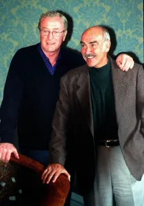 Michael Caine (L) and Sean Connery August 1997 face the press at the Caldonian Hotel in