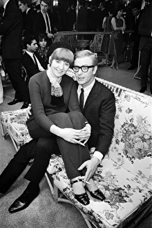00942 Prints: Michael Caine, who stars in the film Alfie poses with Cilla Black