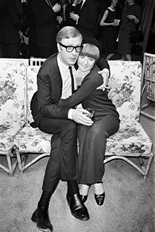 Michael Caine, who stars in the film Alfie poses with Cilla Black
