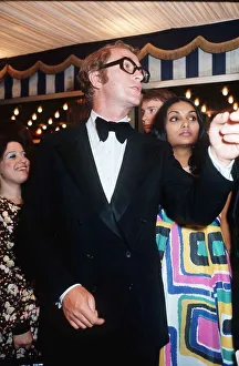 Tuxedo Prints: Michael Caine and his wife at the film Premiere Live and Let Die July 1979