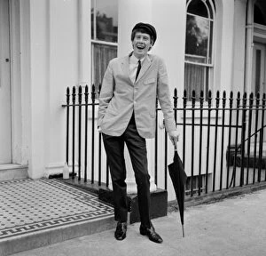 00879 Collection: Michael Crawford (23) photographed outside his home in Sussex Gardens, London, W2
