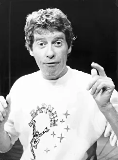 Comedians Prints: Michael Crawford actor and singer wearing a Barnum sweat shirt