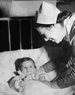 Michael David aged 5 months, a poor foundling who has been bombed from his home