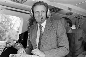 01028 Prints: Michael Heseltine in a helicopter. He is pictured a few days following his resignation as