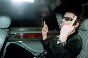 Cdburnt Prints: Michael Hutchence leaving Paula Yates flat giving the photographers the finger dbase msi