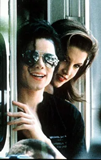 Michael Jackson pop Singer wearing dark glasses With Lisa Marie Presley