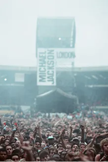 Michael Jackson can be seen performing on stage at Wembley during the Bad concert tour