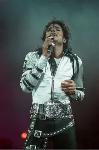 Michael Jackson can be seen performing on stage at Wembley during the Bad concert tour