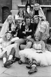 Michael Palin of the Monty Python team with girls from Sidcup during the charity Twits