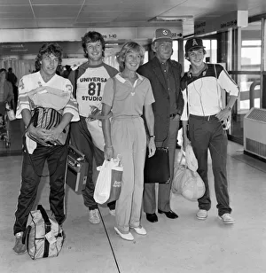 Michael Parkinson arrives at Heathrow with his wife Mary and sons Nicholas