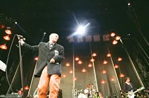 Images Dated 23rd July 1995: Michael Stipe, lead singer with the American Rock Group REM, perform at Cardiff Arms Park