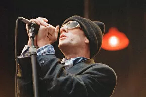 Images Dated 23rd July 1995: Michael Stipe, lead singer with the American Rock Group REM, perform at Cardiff Arms Park