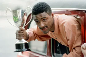 Michael Watson with the British Commonwealth middleweight trophy after defeating Nigel