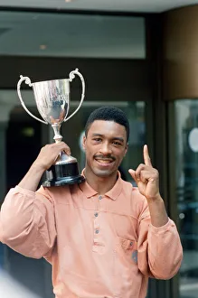Michael Watson with the British Commonwealth middleweight trophy after defeating Nigel