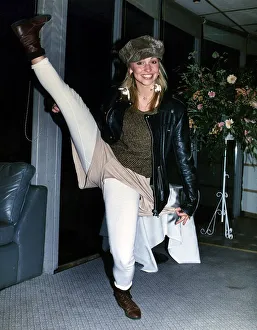 Michaela Strachan TV Presenter kicking her right leg up high