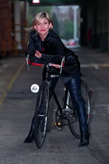 Michelle Collins Actress December 1997 Who stars in Eastenders sitting on bike