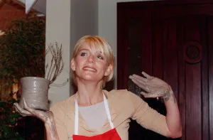 00194 Prints: Michelle Collins Actress March 98 Trying her hands on the potters wheel outside