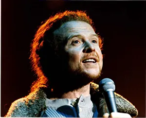 Mick Hucknall pop singer with Simply Red performing on stage