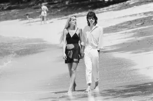 Mick Jagger and Jerry Hall seen here taking a stroll along the beach at Gibbs Bay in