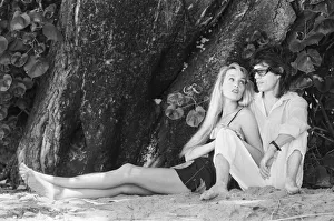 00376 Prints: Mick Jagger and Jerry Hall seen here taking a stroll along the beach at Gibbs Bay in