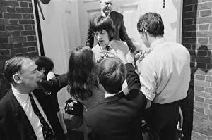 00882 Prints: Mick Jagger, lead singer of the Rolling Stones pop group is surrounded by autograph