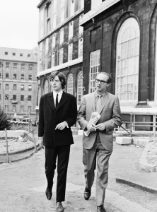 Suit Prints: Mick Jagger of The Rolling Stones with his lawyer Mr Dale Parkinson after receiving a