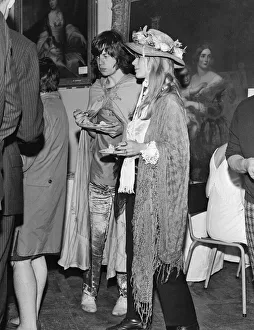 Cloak Prints: Mick Jagger of The Rolling Stones and Marianne Faithfull at the Butler dinner society in
