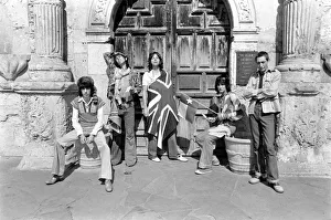 00291 Prints: Mick Jagger (with Union Jack flag) and his Rolling Stones band stand at the famous Alamo