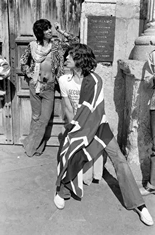 00291 Prints: Mick Jagger (with Union Jack flag) and his Rolling Stones band stand at the famous Alamo