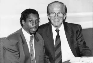 00130 Prints: Mickey Duff Boxing manager and Promoter sits with Boxer Pat Barrett at the Stakis