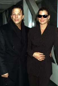 Mickey Rourke Actor arriving at Heathrow from Los Angeles with Carrie Otis Actress here