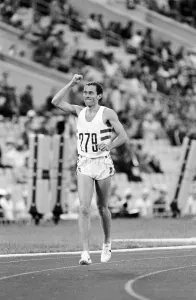 Middle distance runner Steve Ovett celebrates after winning a gold medal in the Men