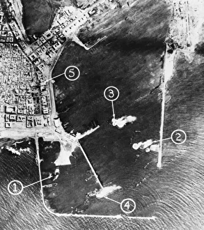 Middle East, score direct hits in attack of Benghazi harbour. R. A