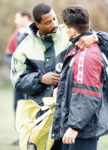 Two Men Prints: Middlesbrough assistant manager Viv Anderson dishes out a bit of advice to player Jaime