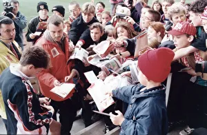 Premiership Prints: Middlesbrough player Juninho is mobbed by fans at the Riverside Stadium before