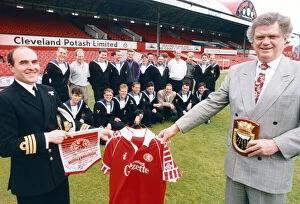 Images Dated 24th May 1991: Middlesbroughs chairman, Colin Henderson, presents a set of shirts