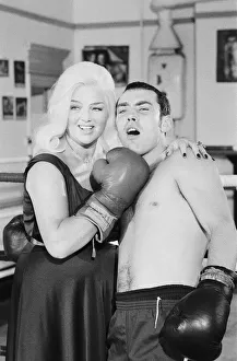 Former Middleweight Champion Alan Minter with singer and Actress Diana Dors at The Thomas
