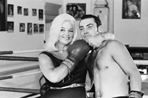 Former Middleweight Champion Alan Minter with singer and Actress Diana Dors at The Thomas