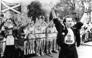Band Aid Prints: Midge Ure infront of runners arms raised at start of race I ran the world charity for