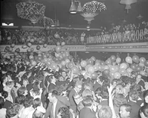 Midnight strikes and 500 balloons cascade on to the dancefloor at the Locarno, Coventry