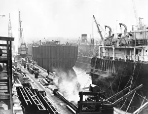 The midshape and stern section of the World Galde during the undocking operation