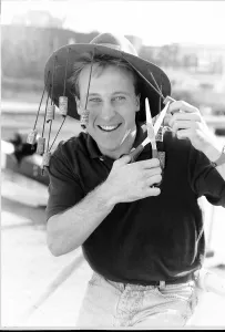 Mike Brosnan TV presenter wearing Australian cork hat