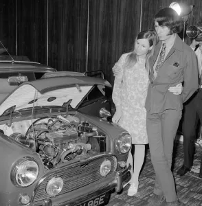 00077 Prints: Mike Mesmith of the American pop group The Monkees with his wife as their newly purchased